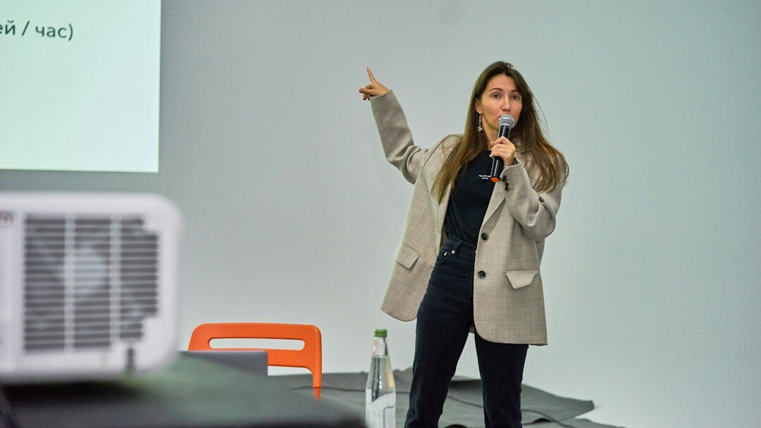 confident speaker on stage