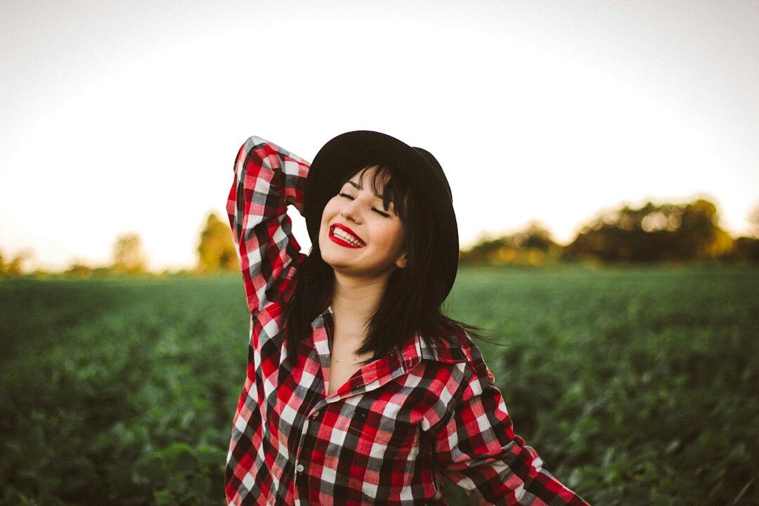 person smiling in nature