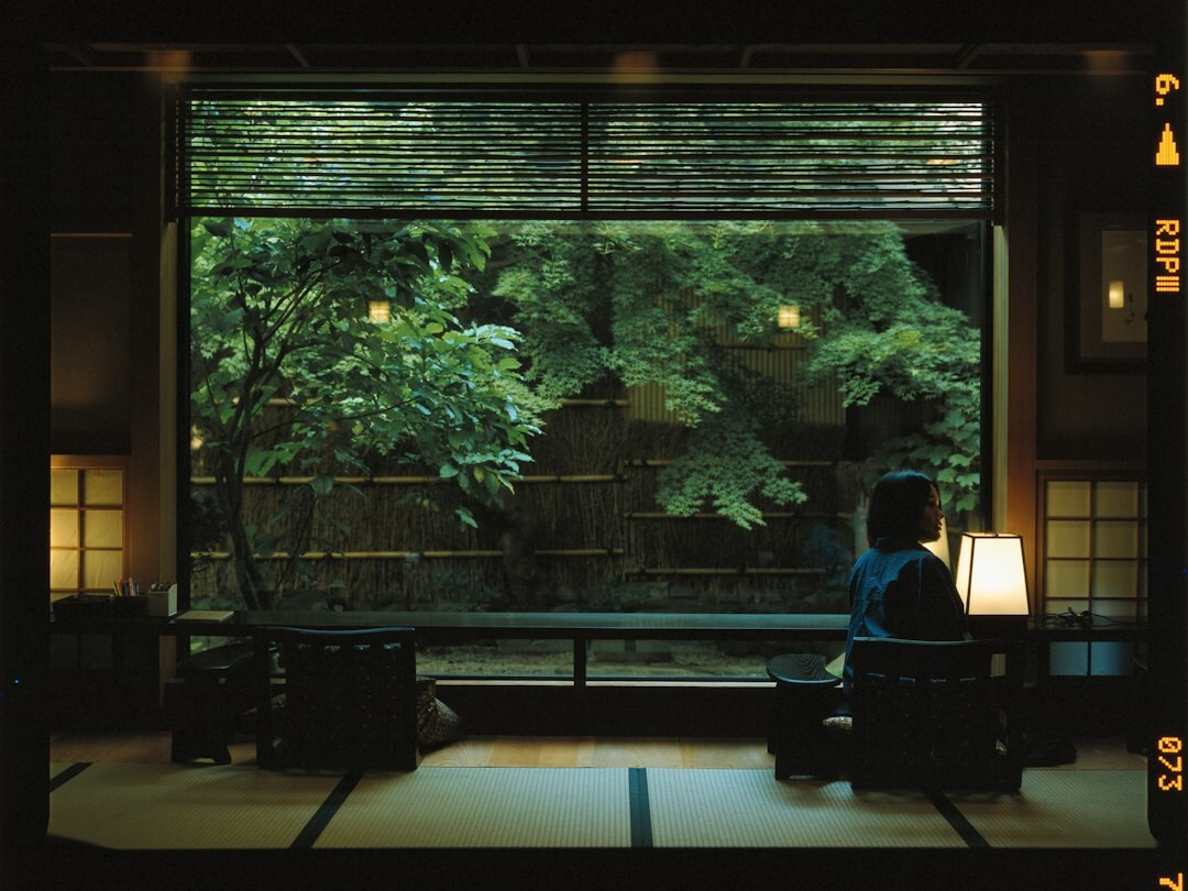 person reflecting alone in quiet room